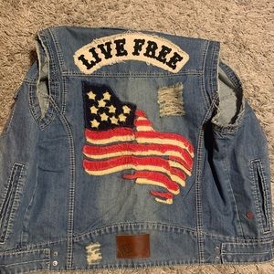 Denim jean jacket with the sleeves cut